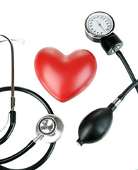 Tonometer, stethoscope and heart isolated on white