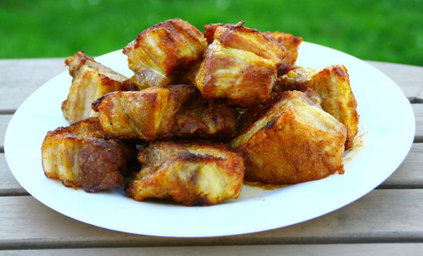 grillons de porc cuits