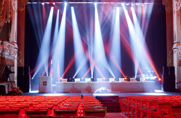 Bright beautiful rays of light on an empty stage