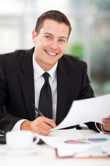 young businessman working in office