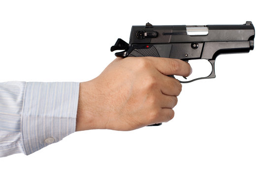 gun in business man hand