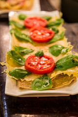 Spanish Tapas of Sliced Tomatoes Basil and Cheese