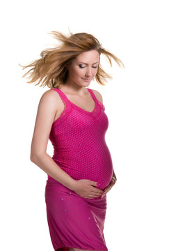 pregnant woman in pink dress