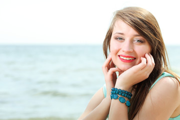 Fototapeta premium young beautiful woman portrait on the beach