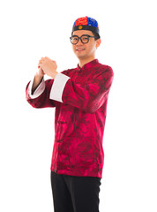 Asian man with Chinese traditional dress cheongsam and gong xi f
