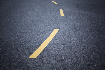 Traffic markings on the asphalt ground