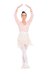 Concentrated gorgeous ballerina standing in a pose © lightwavemedia