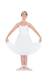 Pensive young ballet dancer standing in a pose © lightwavemedia