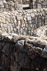 ancient stone wall of a fortress with regular stones