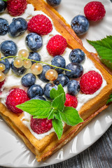 Waffels with cream and blueberry and raspberry