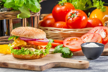 Homemade hamburger with chicken and vegetables