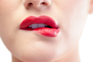 Fototapeta premium Close up on gorgeous model biting red lips