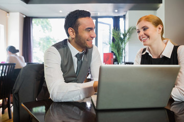 Happy business people working together