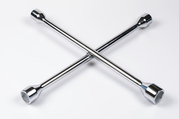 Tire lug wrench isolated on a white background