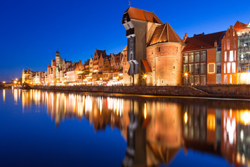 Old town of Gdansk with ancient crane at night, Poland - obrazy, fototapety, plakaty