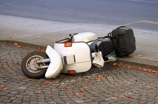 Fototapeta Scooter down on the street