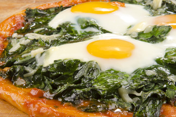 italian pizza with spinach and egg