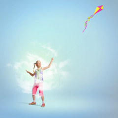 Fototapeta na wymiar Girl with kite