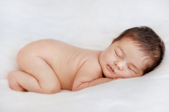 Adorable Baby Sleeping On Stomach