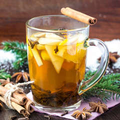 Spicy tea with apple and orange, cinnamon, star anise, Christmas