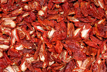 dried red ripe tomatoes for sale at vegetable market