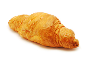 Fresh and tasty croissant over white background