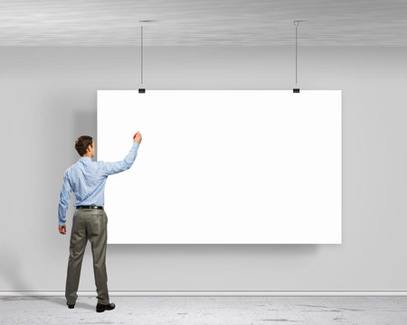 Businessman with banner - Powered by Adobe