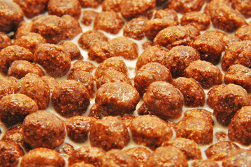 Chocolate cereals with milk background