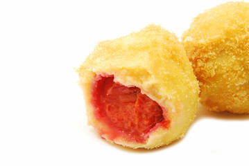 Dumplings with plums isolated on white