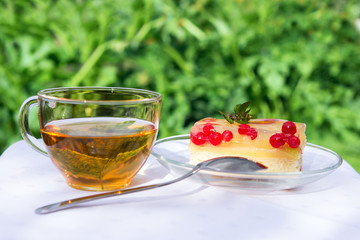Beautiful dessert from sweets in garden in the summer afternoon