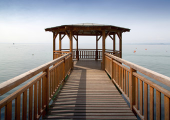 Wooden pier and gazebo on a lake