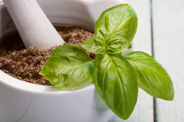 Basil pesto in a small bowl
