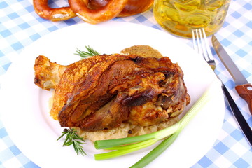 Grilled pork with pickled cabbage,  beer and pretzels