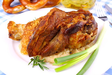 Grilled pork with pickled cabbage, pretzels and beer