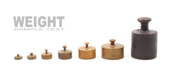 Set of a vintage weights for a old balance scale.