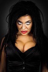 Naklejka premium Closeup portrait of an expressive young woman with creative make
