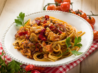 pasta with fish ragout and hot chili pepper