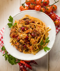 pasta with fish ragout and hot chili pepper