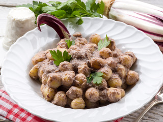 gnocchi with chicory and ricotta sauce