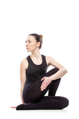caucasian woman exercising pilates