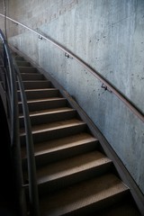 Metal and Concrete Industrial Curved Staircase