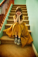 Teen Girl With Formal Prom Gown and Sneakers