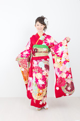 Beautiful asian kimono woman on white background