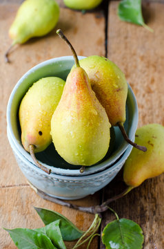 Fresh pears on a wooden table