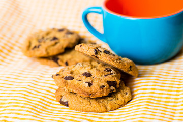 Chocolate chips cookies with a drink