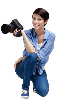 Woman-photographer takes snapshots, isolated