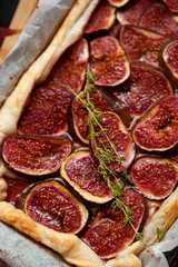Homemade fig pie with brie cheese and honey