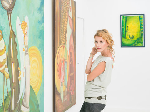 beautiful woman visiting an art gallery