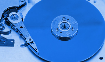 Open computer hard drive on white background