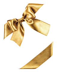 golden bow made from silk ribbon